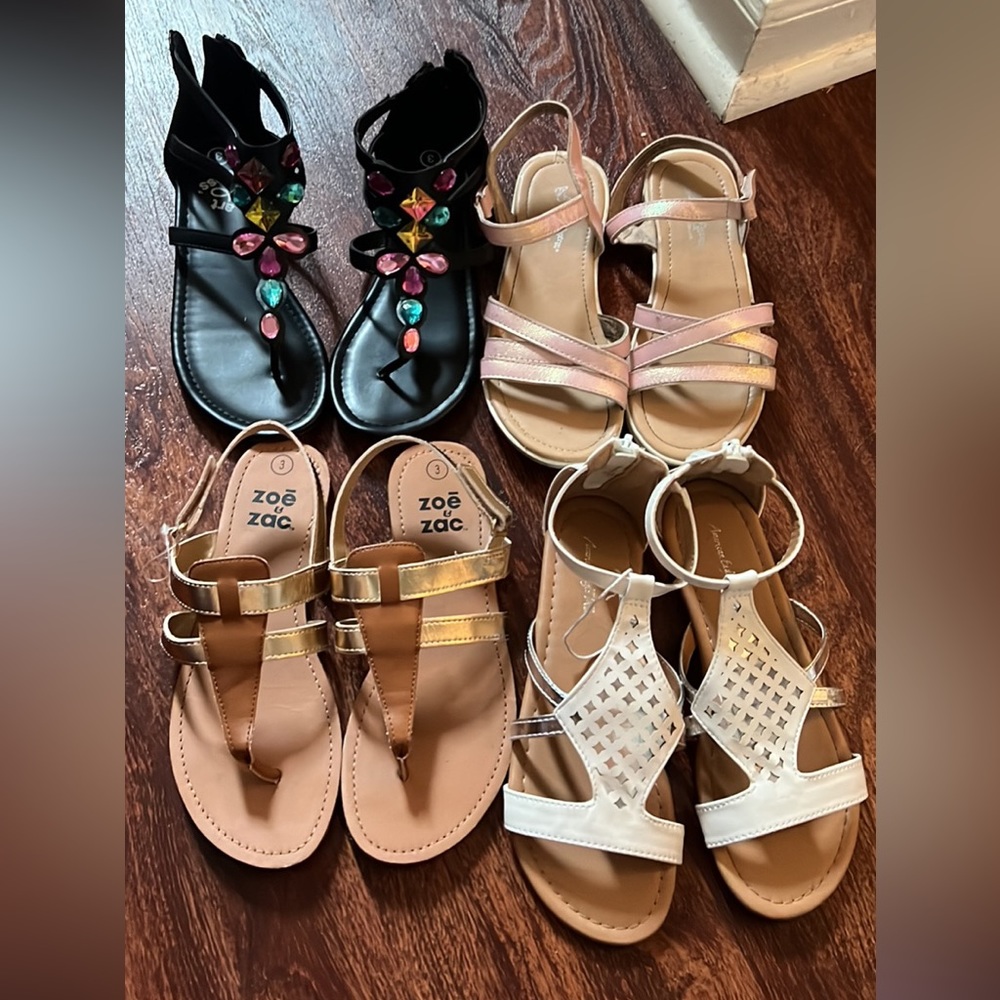 Four pairs of size 3 shoes NWOT